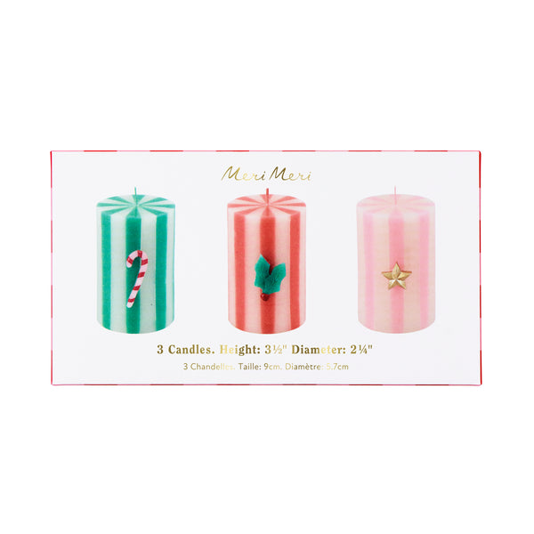 Our Christmas candles, in a stylish pillar shape, feature, green, red, white and pink stripes, with wax icons and elegant coloured wicks. A great gift. Image3