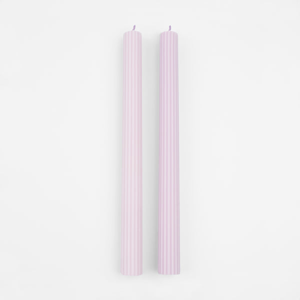 Our tall candles, in a lilac colour, are perfect for any party with a purple theme.