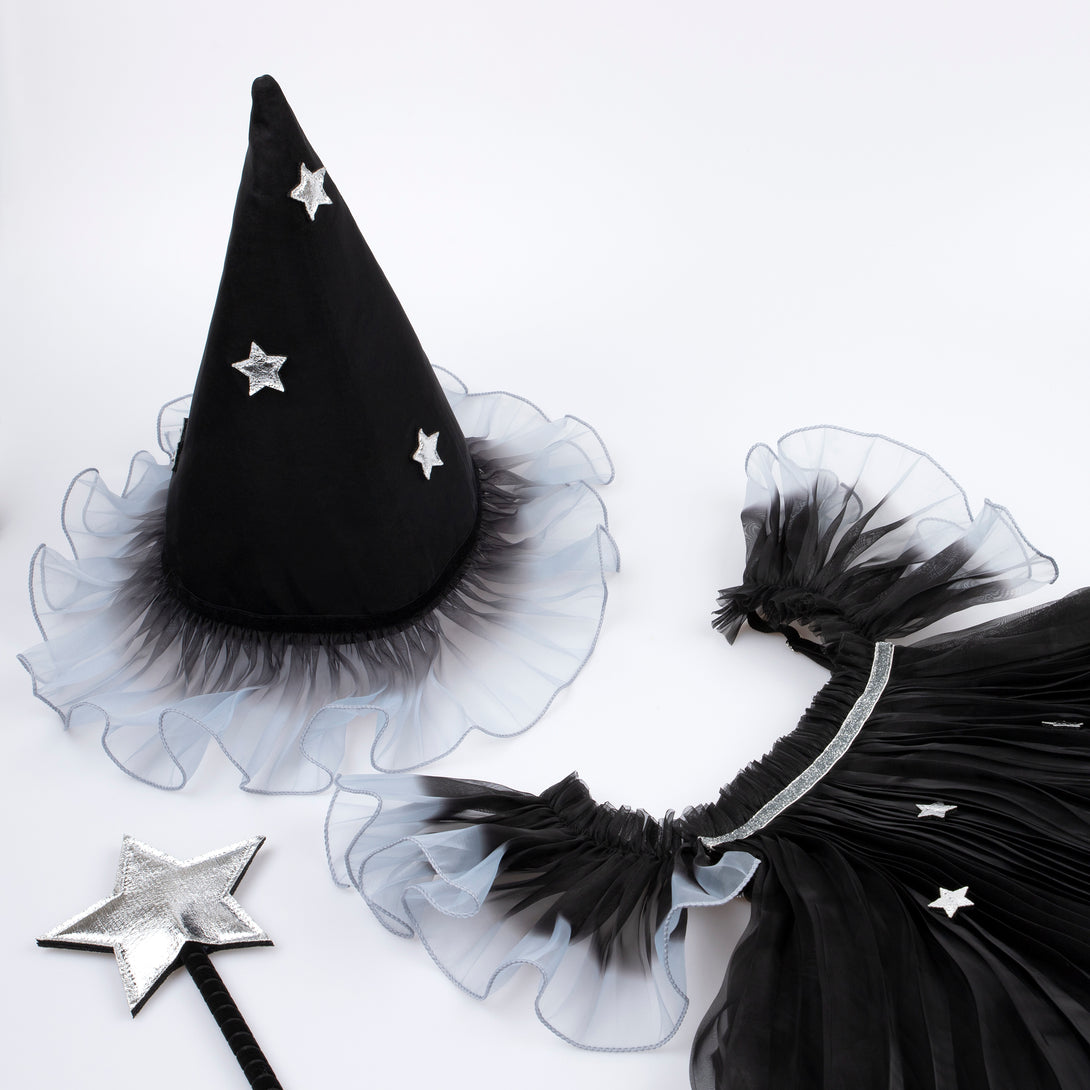 Our witch costume, with a witch hat, dress and wand, is the perfect kids Halloween costume for those who love to look magical. Image2