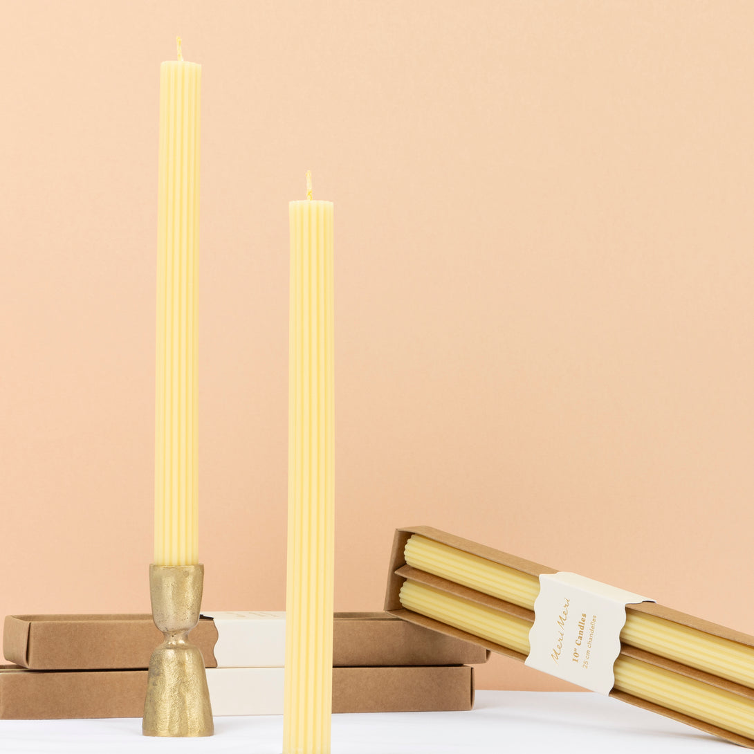 Our long candles, in a cheery yellow, look amazing on the mantel or table. Image1