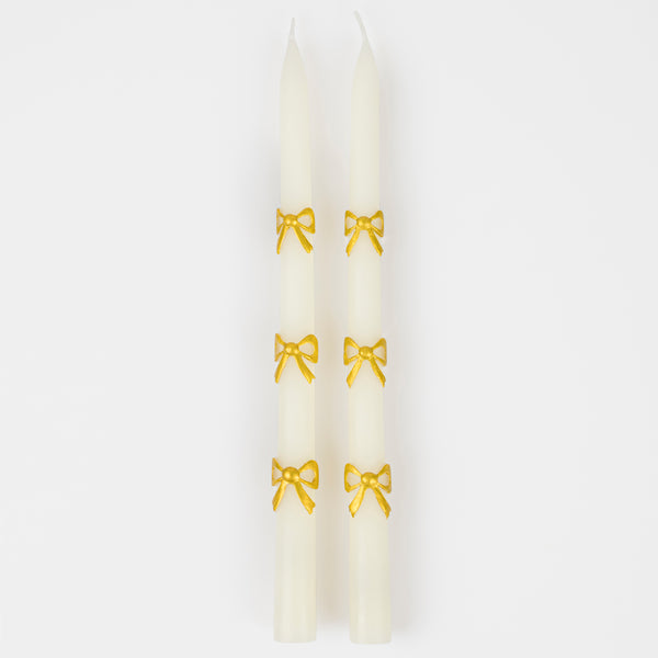 Our taper candles, with a bow design, are perfect as Christmas decorative candles. Image5