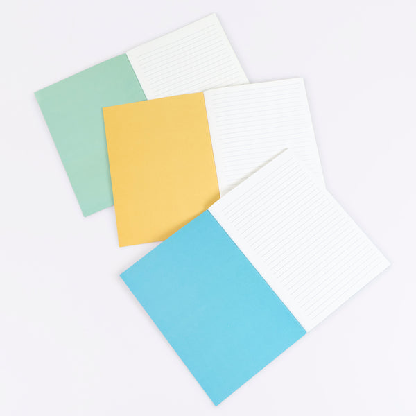 Our lined notebooks come in a set of three, all with pretty floral covers, and tied together with a paper band and neon coral cord, a lovely gift. Image3