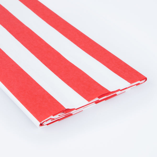 Our red and white striped tablecloth is the perfect Christmas paper tablecloth for all your festivities. Image2