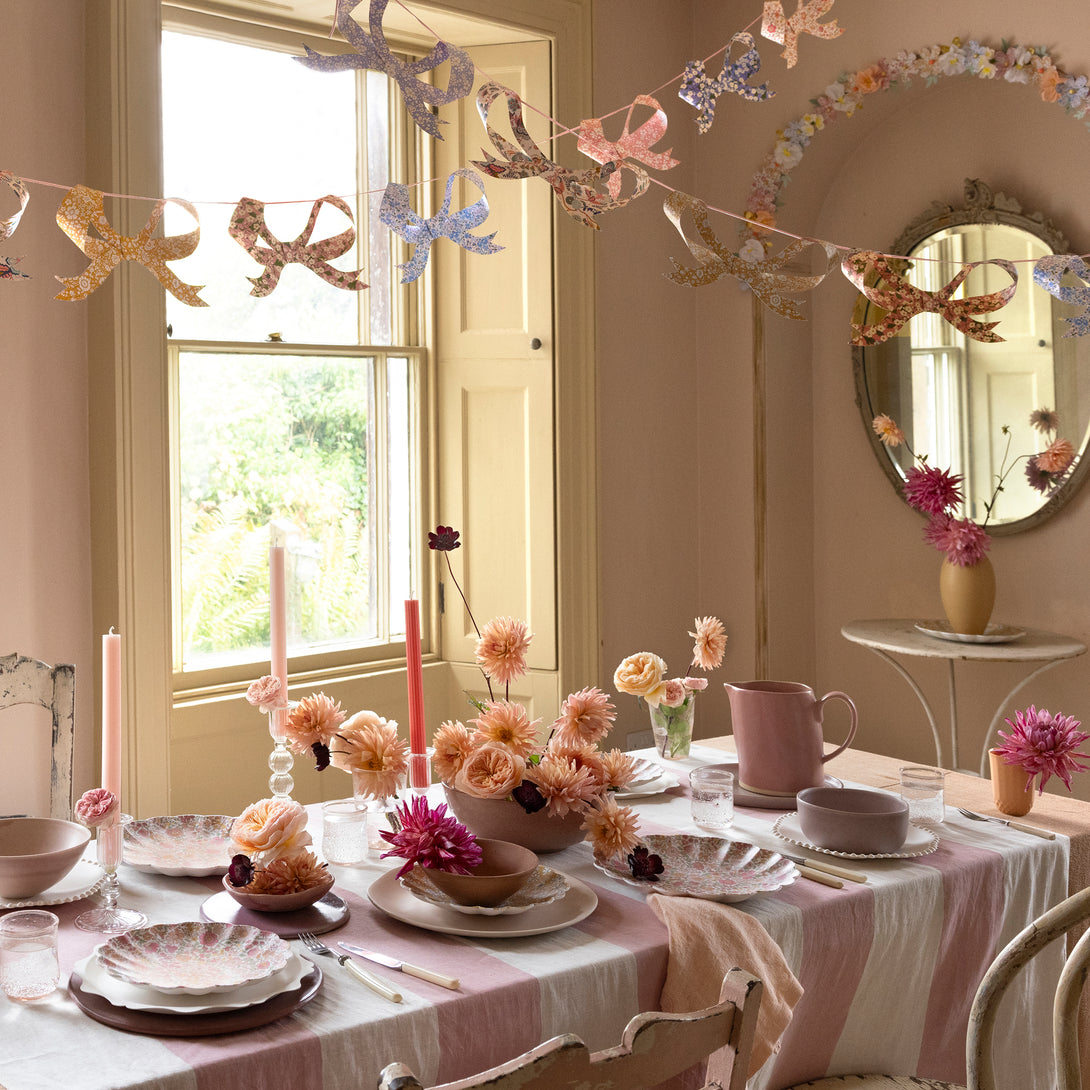 Our paper garland has pretty Liberty bow pennants and a pink velvet ribbon, a versatile garland