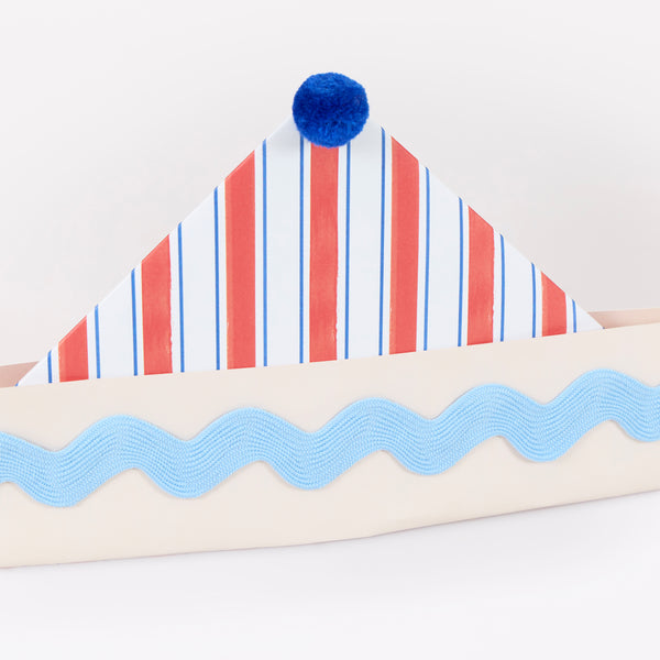 Our party hats are beautifully made from paper in the shape of sailor hats with stripe designs and embellished with ricrac and pompoms, Image3