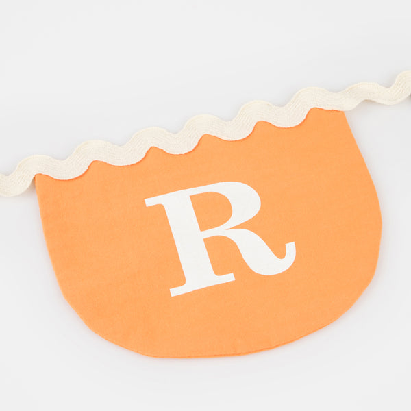Our black and orange Halloween garland is made from fabric, so is the perfect reusable Halloween decoration. Image3