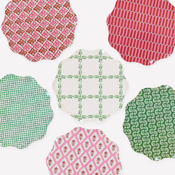 Our Christmas side plates, made from heavyweight paper, feature Molly Mahon block print designs in seasonal colours for a stylish look. Image1