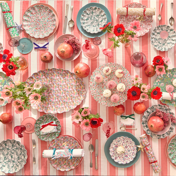 Our small Christmas melamine plates feature 8 Liberty floral print designs in red and green tones for a stylish look, year after year. Image2