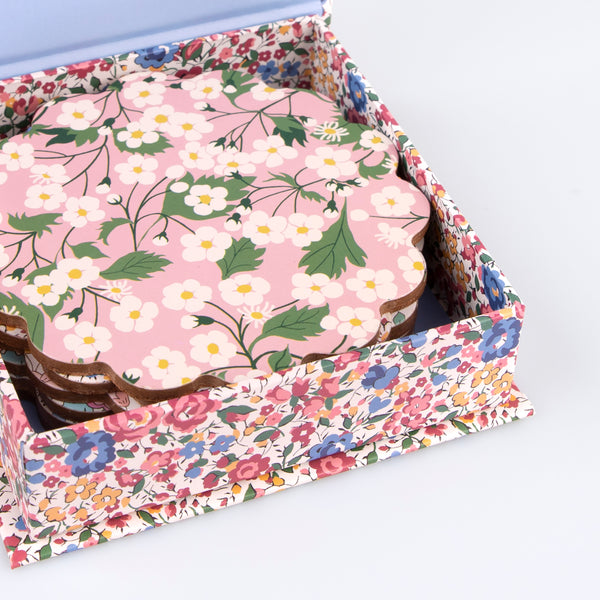 Our wooden coasters are made from a composite wood with floral Liberty prints, a laminated finish and a cork backing. Image5