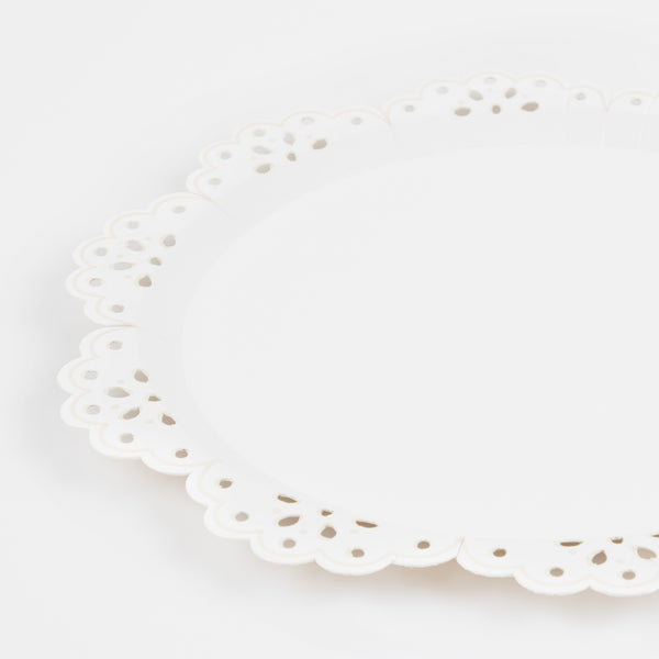 Our paper side plates have a pretty lace design, with embossed details, ideal as baby shower plates. Image3