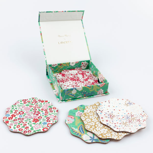 Our Christmas coasters, made from a laminated wood composite, feature elegant Liberty print designs, perfect as a host gift. Image3