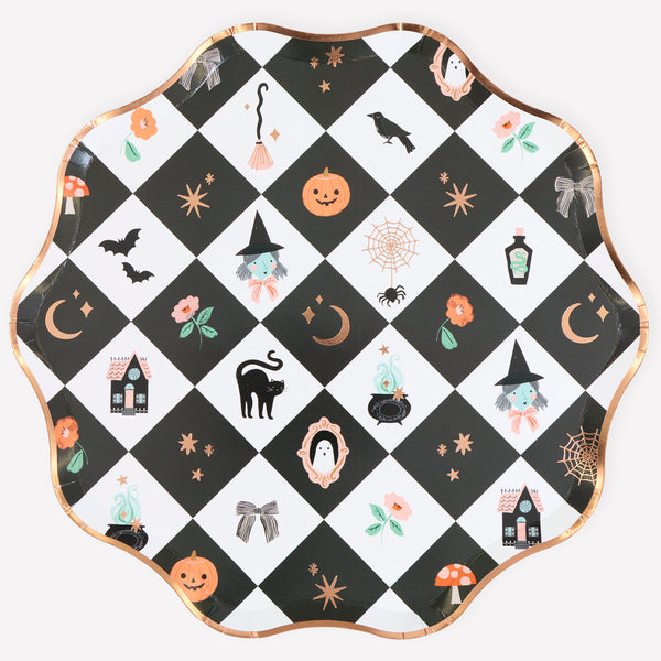 Our Halloween plates, made from paper in a dinner plate size, feature a patchwork pattern, happy characters and shiny pops of copper foil. Image1