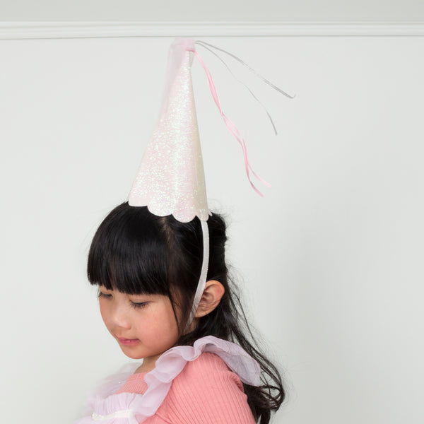 This costume, with a princess dress and hat with tassels, is perfect for a princess party. Image2