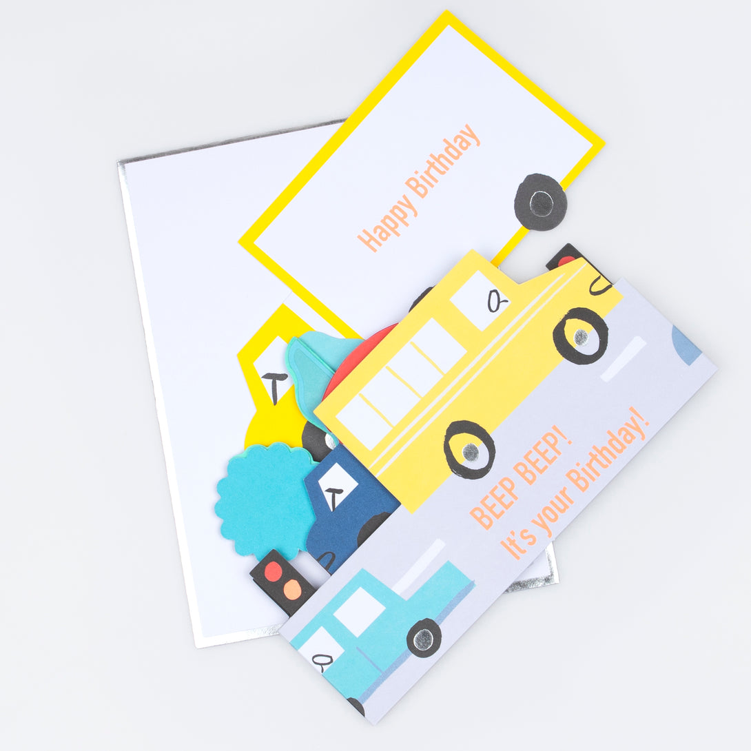 Our concertina card, with lots of colourful vehicles, is the perfect birthday card for a transport-themed party.