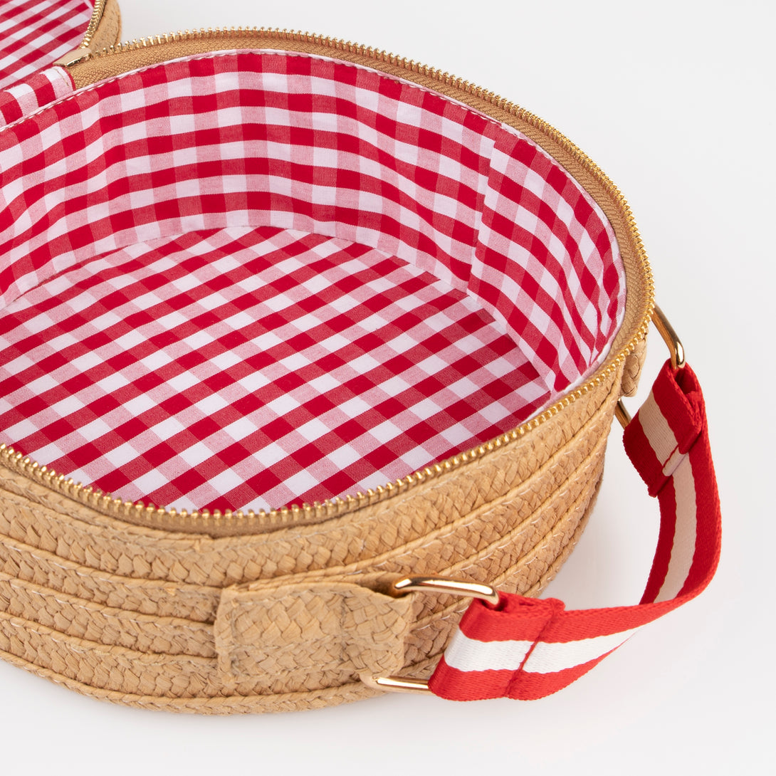 Our bear bag is crafted from sturdy paper with a fun gingham lining, perfect to wear to parties or for picnics.