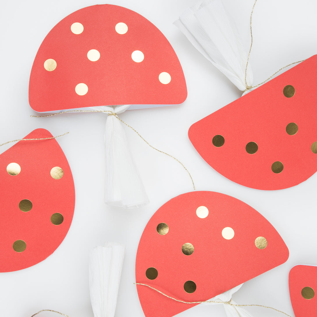 Our luxury Christmas crackers, in the shape of mushrooms, contain a red party hat, a joke and a fun enamel mushroom charm.