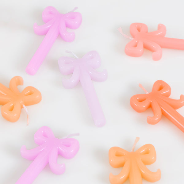 Our mini birthday candles, in a stylish bow shape in five shades of pink and peach, are ideal to add decoration to birthday or bridal shower. Image4