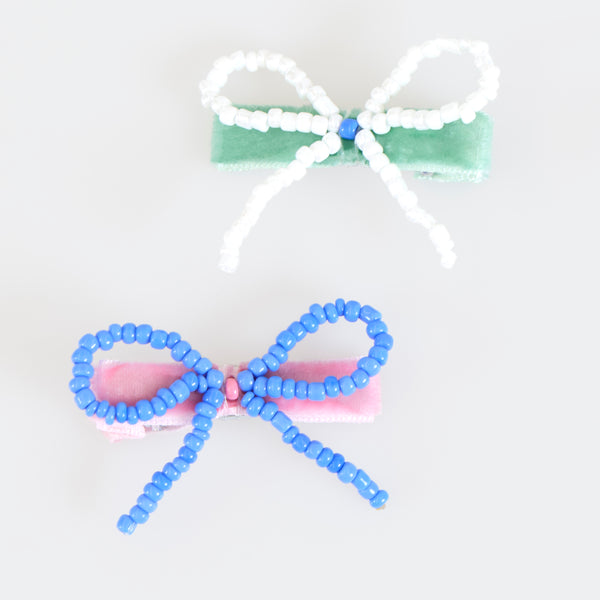 Our bow hair clips are made with pretty beads and velvet-covered clips for a really stylish hair accessory. Image4