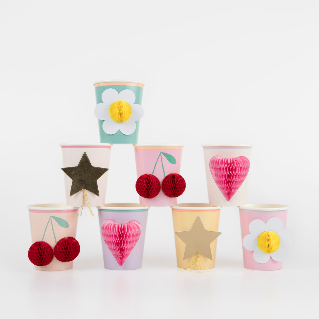 Our paper cups have fun designs with a 90s vibe, including flowers, hearts, cherries and stars. Image1