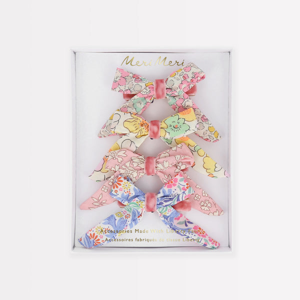 Make your hairstyle look amazing with our bow hair clips crafted from floral Liberty fabric.