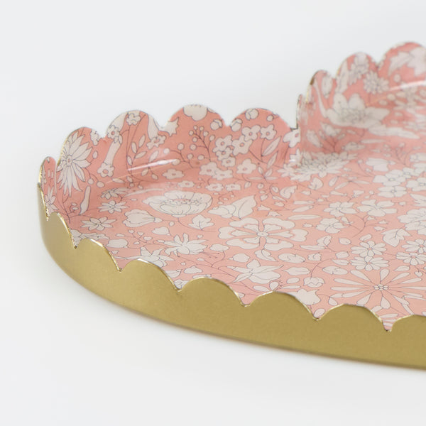 Our jewellery tray is made from enamelled metal, in a heart shape, with a pretty pink and white Liberty floral print design. Image2