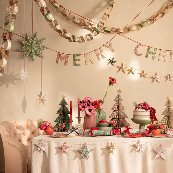 Use our paper chain garland, with Liberty prints in festive colours, as the ideal Christmas hanging decorations. Image2
