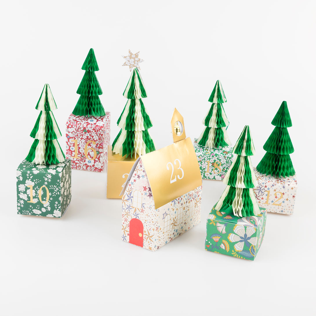 Our Christmas advent calendar creates a 3D village scene, with Liberty prints, shiny gold foil details and honeycomb trees, to fill with fun gifts. Image5