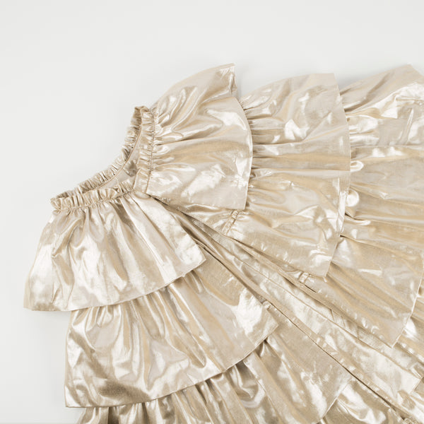 This gorgeous cape, crafted from gold lamé fabric, looks sensational. Image3