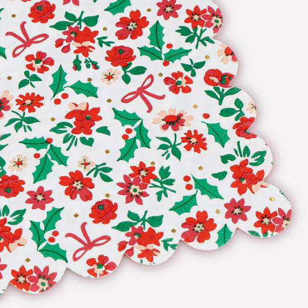 Our Christmas paper napkins, in a small size, feature an elegant red ditsy print with holly, flowers and bows, for a current yet classic look. Image2