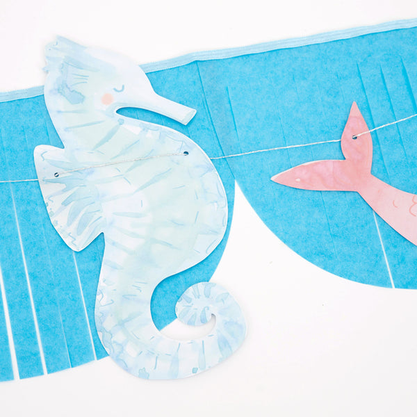 Our mermaid party supplies bundle includes mermaid tableware and a mermaid garland.  Image4