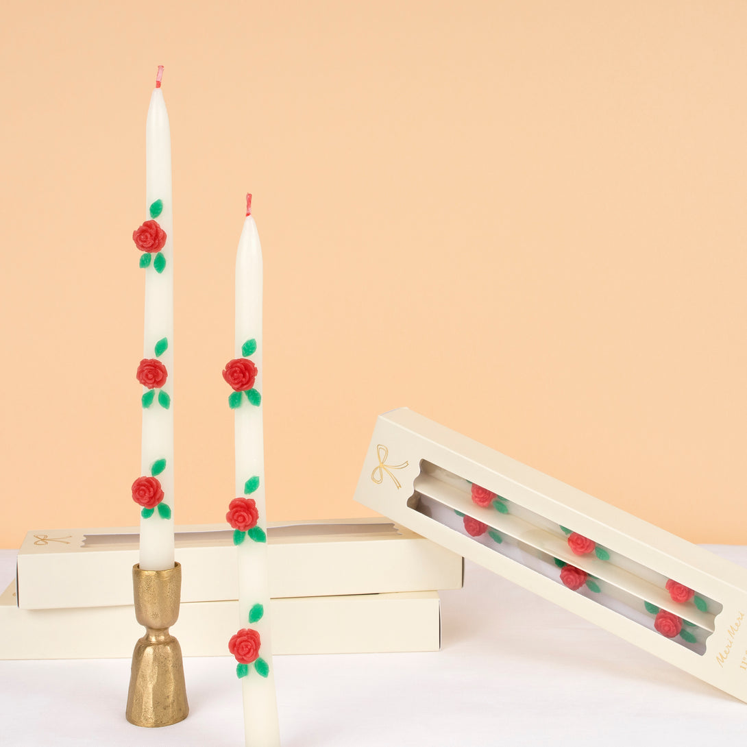 Our ivory candles have red rose embellishments and red wicks, ideal to add to your Valentine's party supplies.