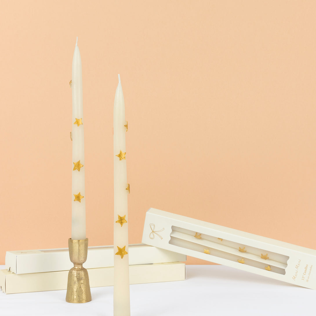Our taper candles, with a bow design, are perfect as Christmas decorative candles. Image1
