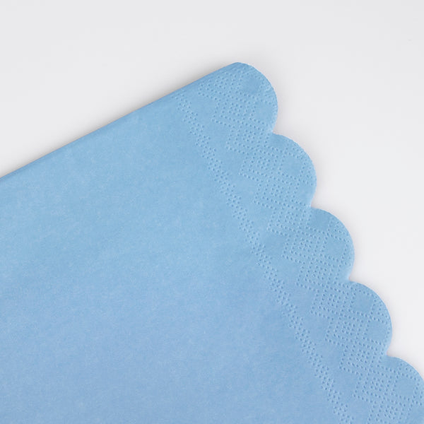 Our small napkins, in a striking shade of blue with a scalloped edge, are ideal for any party. Image2