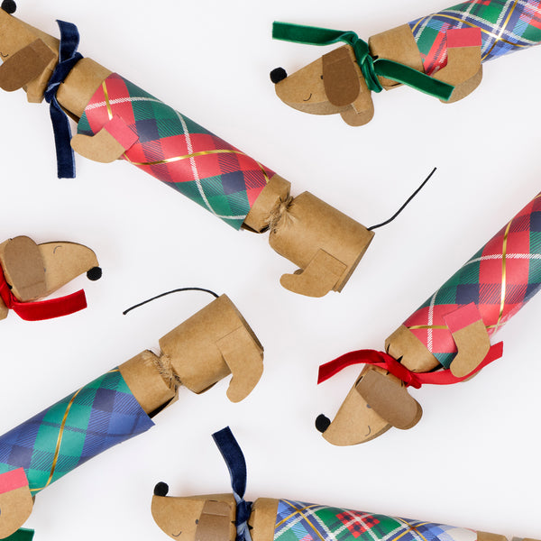 Our sausage dog Christmas crackers have adorable tartan coats and velvet scarves, and contain a paper hat, joke and sausage dog pin. Image3