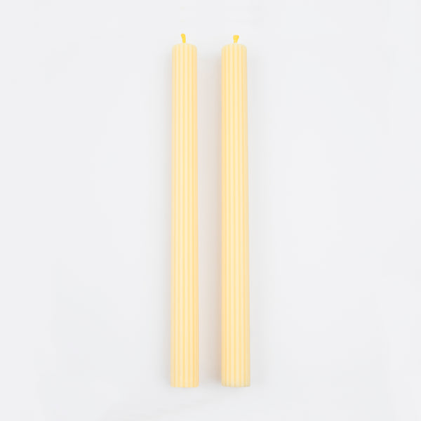 Our long candles, in a cheery yellow, look amazing on the mantel or table. Image4