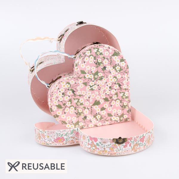 Our mini suitcases feature pretty Liberty floral prints in pink tones, fabulous for kids aged 3+ and adults, for travel and storage. Image1