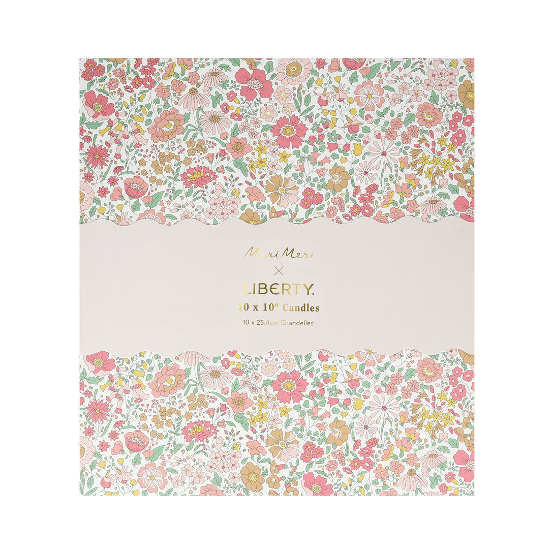 Our candle gift box includes 10 table candles in 5 soft colours, all beautifully presented in a Liberty print floral box.