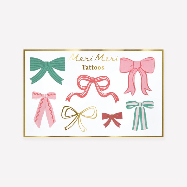 Our temporary tattoos feature Christmas bow designs in a mix of classic and modern colours with shiny gold foil details for a stunning look. Image1