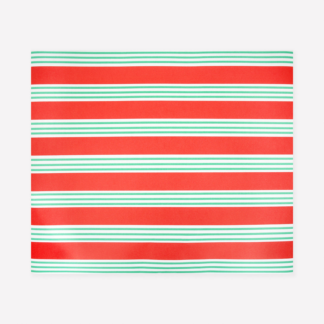 Our Christmas table runner, made from high-quality paper, features bold stripes in red and green for a wonderful festive look. Image1