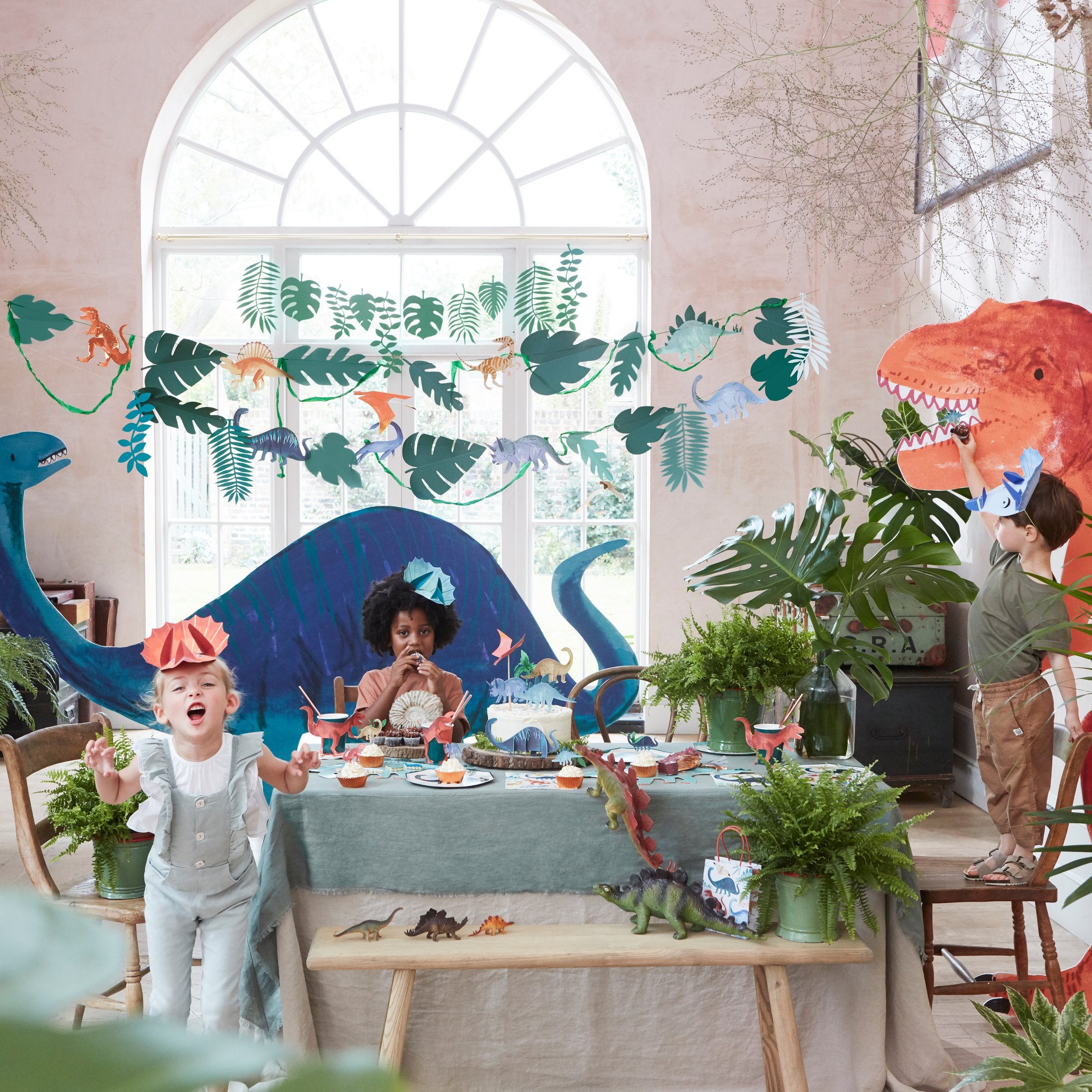 Our large garland, featuring colourful dinosaurs, is perfect for a dinosaur themed party.