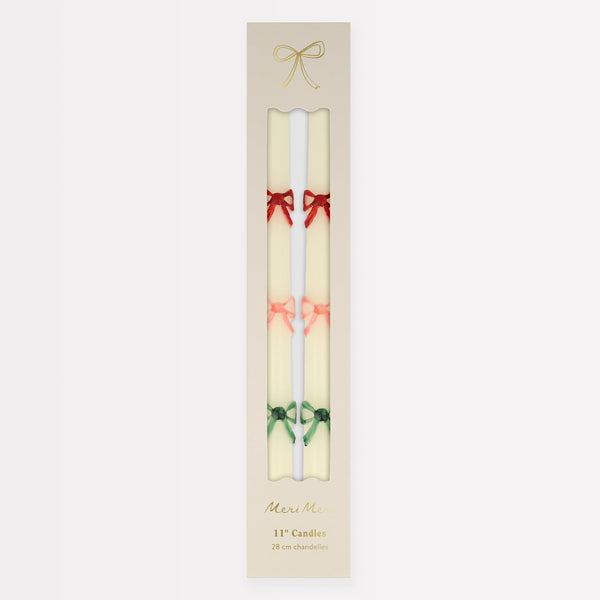 Our taper candles, with a bow design, are perfect as Christmas decorative candles.