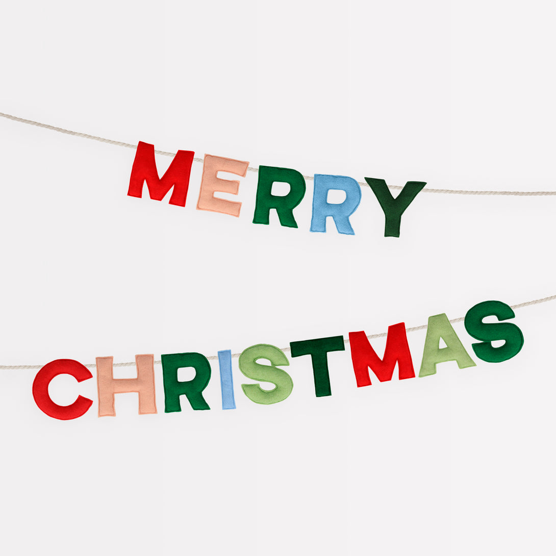 Our Christmas garland, crafted with colourful felt pennants, is the perfect Christmas wall decoration.