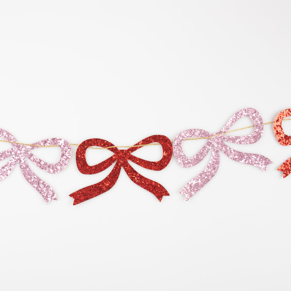 Our Christmas garland is crafted with red and pink glitter fabric bows, perfect for a Christmas wall decoration or Christmas table decoration. Image4