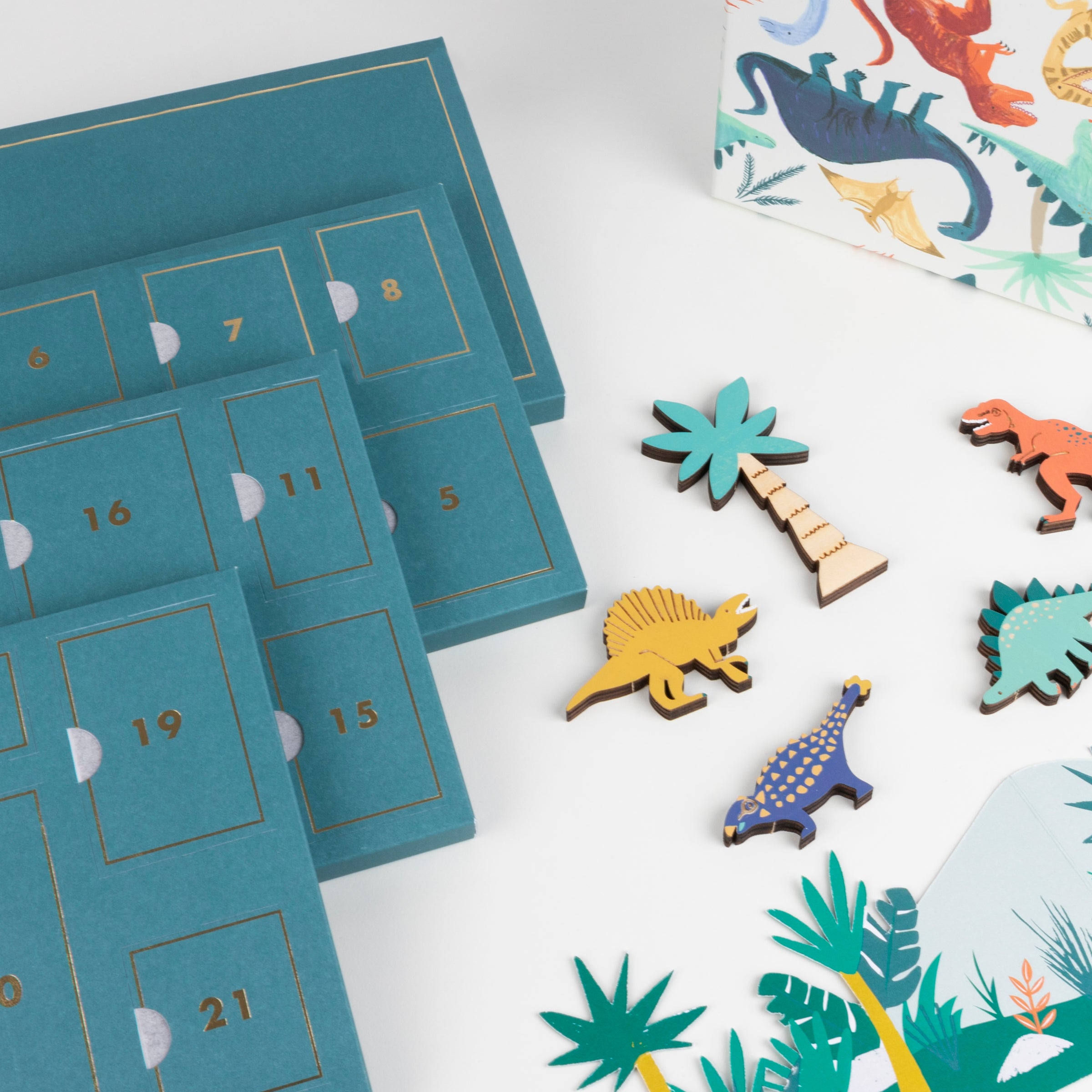 This is the perfect advent calendar for boys, featuring wooden dinosaur toys.