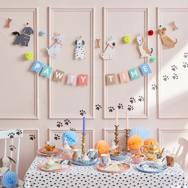 This adorable paper garland, featuring dogs, is perfect for a dog's birthday party or a dog themed party. Image2