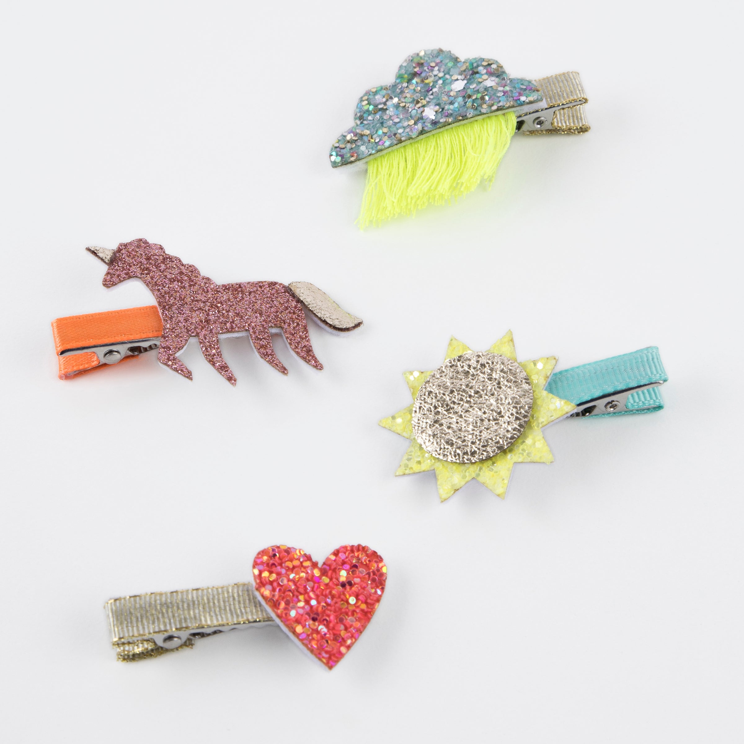 Our hair clips for kids are made with glitter fabric and leatherette for party hair styles.