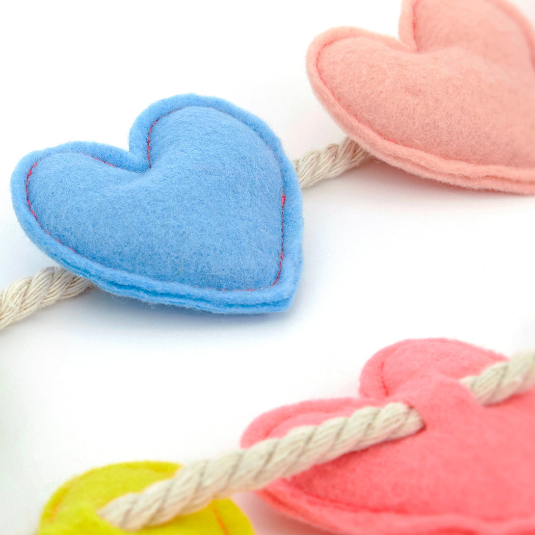 Our felt garland, featuring colourful hearts, is the perfect anniversary decoration or Valentine's Day decoration.
