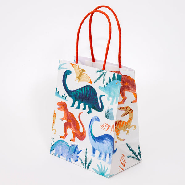Our colourful dinosaur goodie bags, with a twisted paper handle, look amazing. Image2