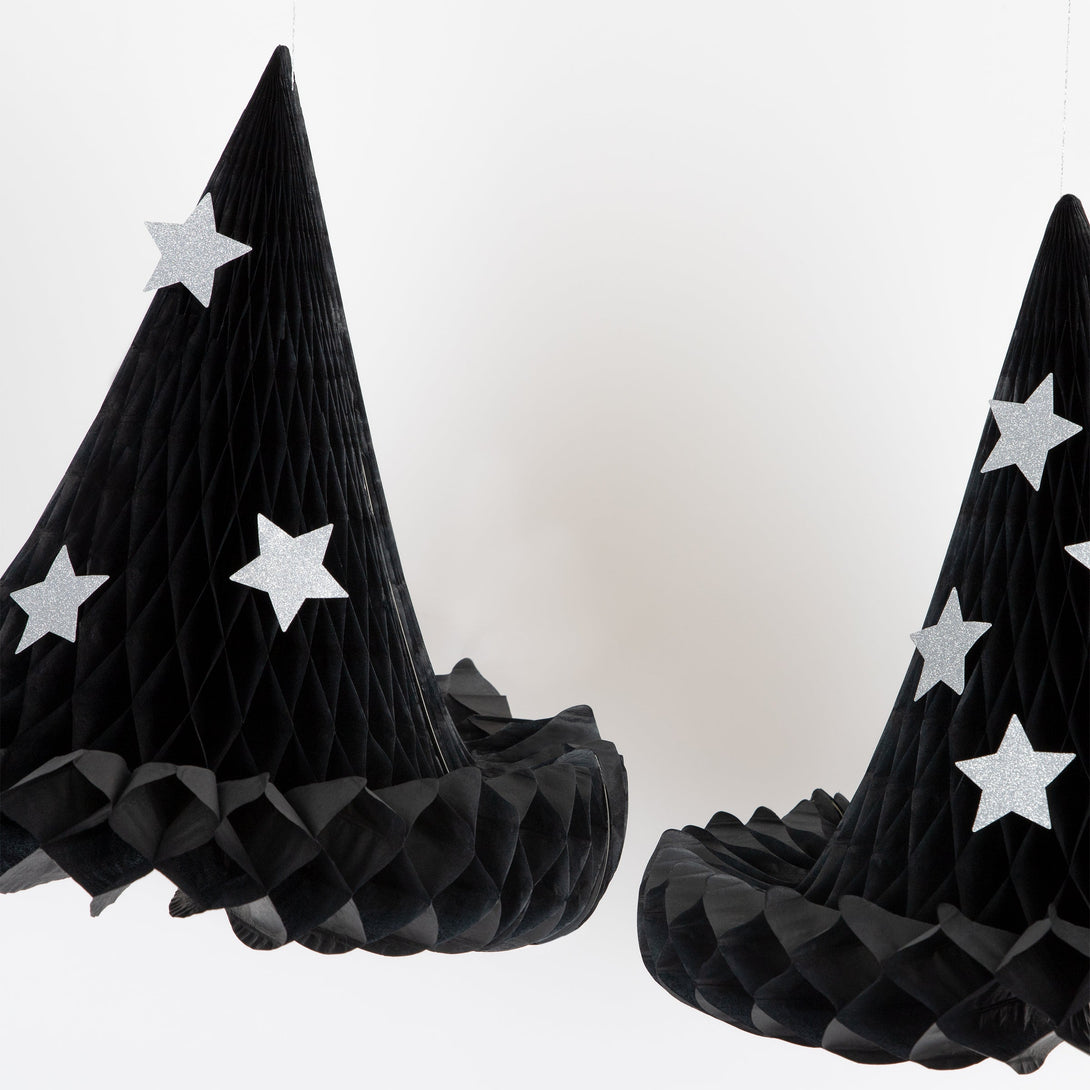 Our witch hats, with silver glitter stars, are the perfect hanging Halloween decorations.