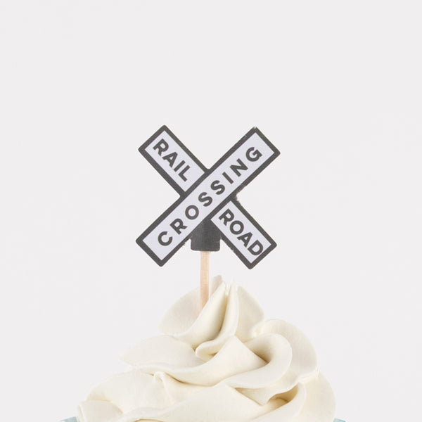 Our special cupcake kit feature train cake toppers and striped blue and teal cupcake cases. Image7